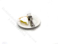 Miniature Lemon Meringue Pie Slice on a Plate with Fork (image for) Miniature Lemon Meringue Pie Slice on a Plate with Fork
