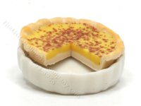 Miniature Sliced Custard Pie in White Ceramic Dish (image for) Miniature Sliced Custard Pie in White Ceramic Dish