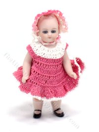 Miniature Porcelain Baby Doll in Pink Knit Dress (image for) Miniature Porcelain Baby Doll in Pink Knit Dress